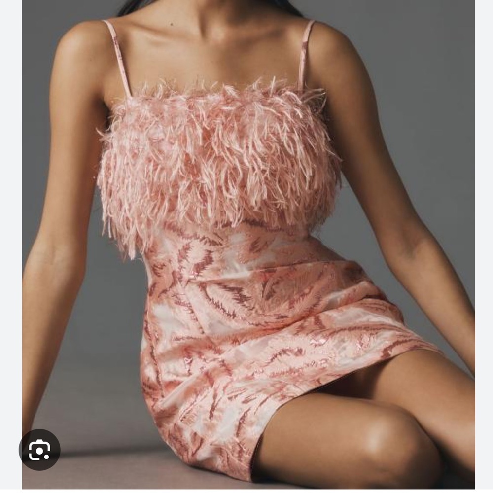 Never worn! Pink feather party dress size M!